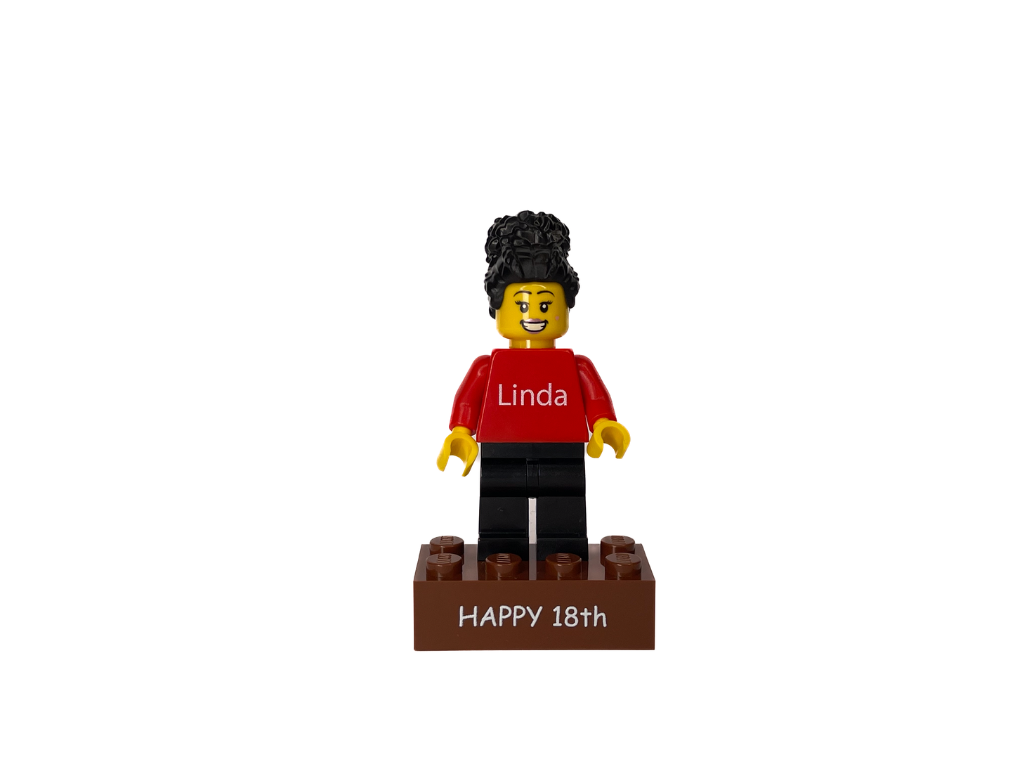 Eine Personalisierte LEGO® Minifigur auf einem individuellem Stein